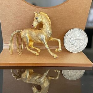 Horse gold tone pin
